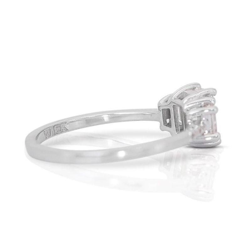 Elegant 0.7ct Emerald Cut Diamond Ring set in  18k White Gold In New Condition For Sale In רמת גן, IL