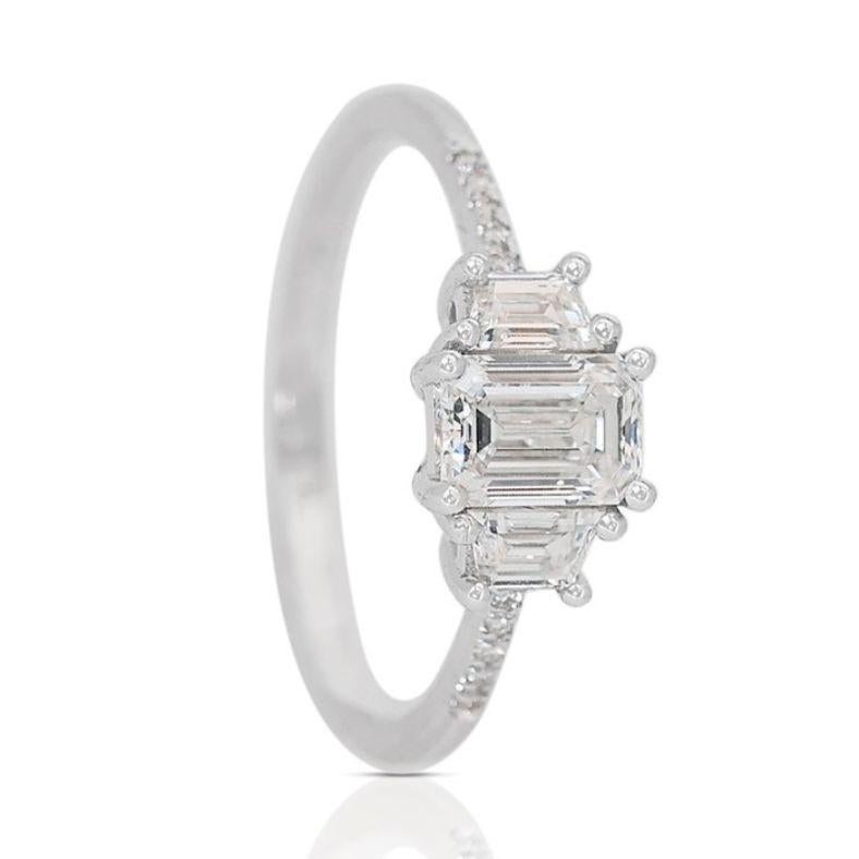 Women's Elegant 0.7ct Emerald Cut Diamond Ring set in  18k White Gold