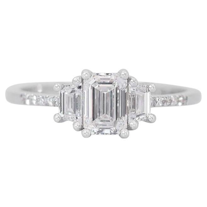 Elegant 0.7ct Emerald Cut Diamond Ring set in  18k White Gold For Sale