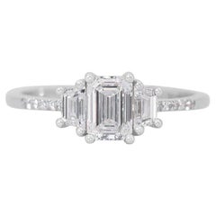 Elegant 0.7ct Emerald Cut Diamond Ring set in  18k White Gold