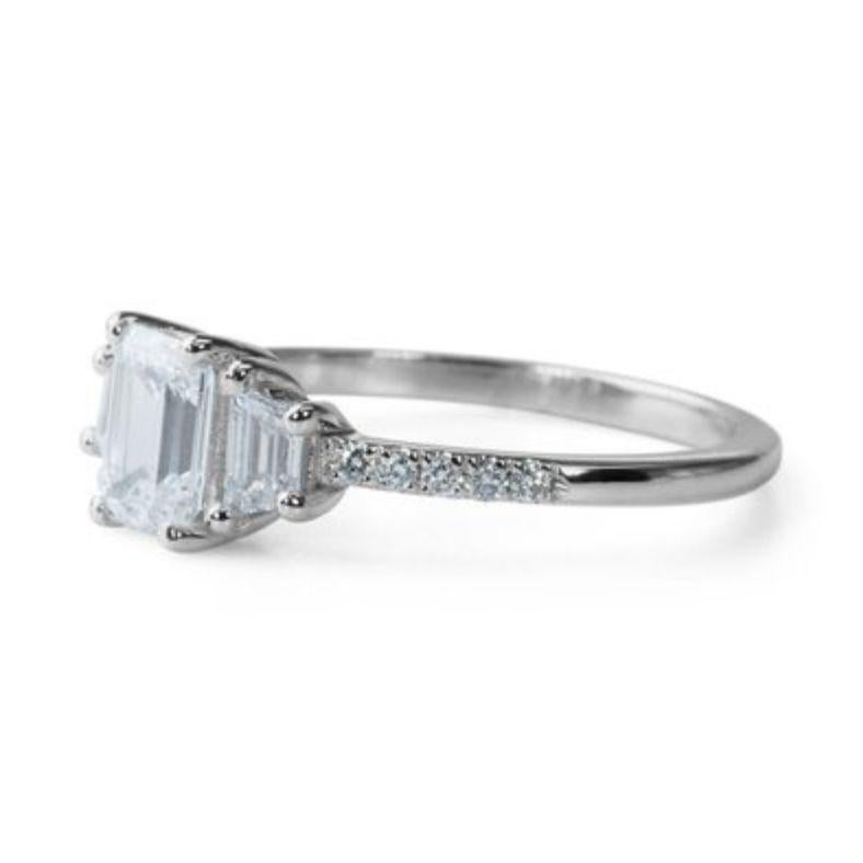 Emerald Cut Elegant 1 Carat Emerald Diamond Ring with Side Accents For Sale