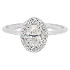 Elegant 1 Carat Oval Diamond Ring in 18K White Gold Elegant 1 Carat Oval Diamond Ring in 18K White Gold