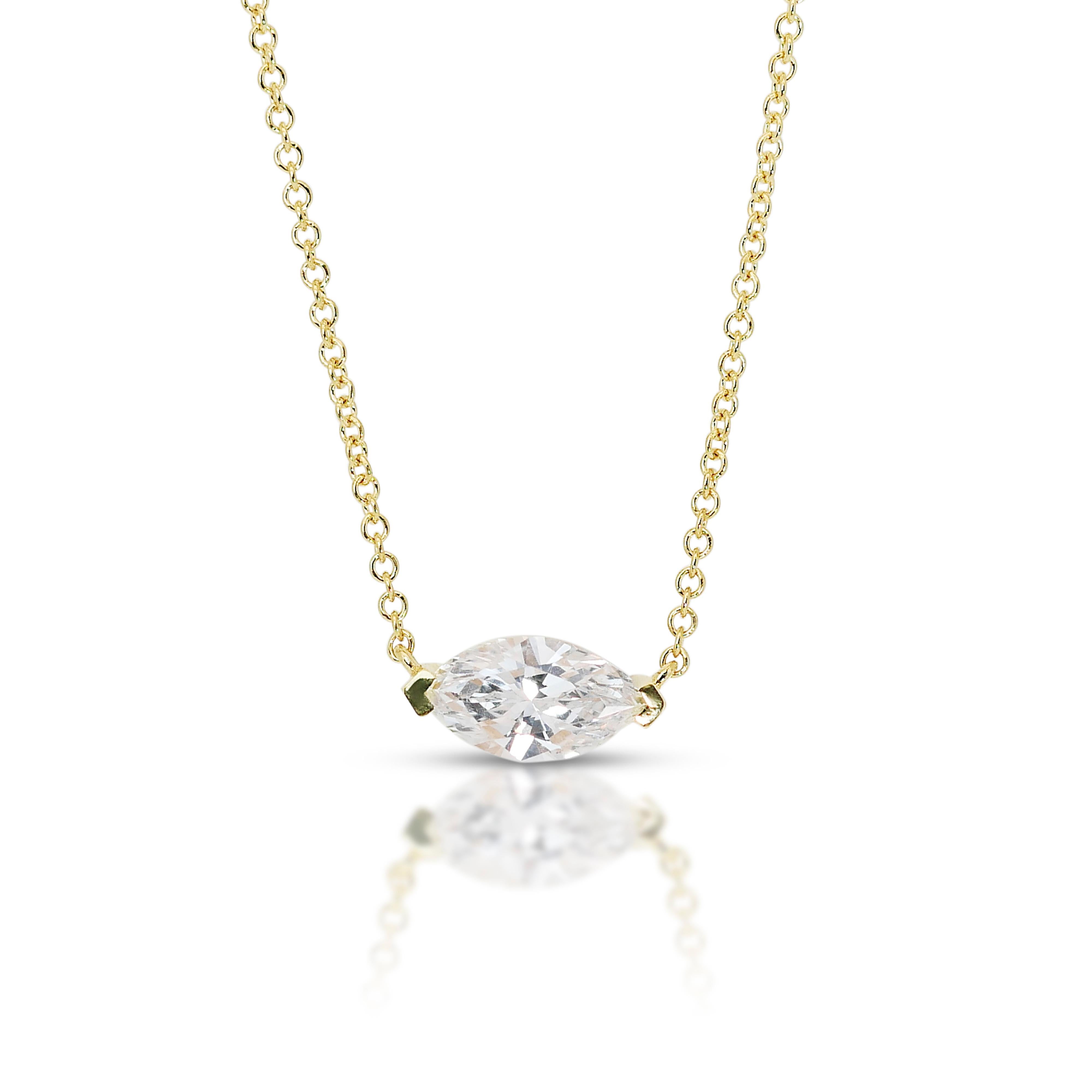 Elegant 1.01ct Diamond Solitaire Necklace in 18k Yellow Gold - GIA Certified

This exquisite solitaire necklace in 18k yellow gold features a stunning 1.01-carat marquise-cut diamond that exudes elegance and sophistication. With its timeless design