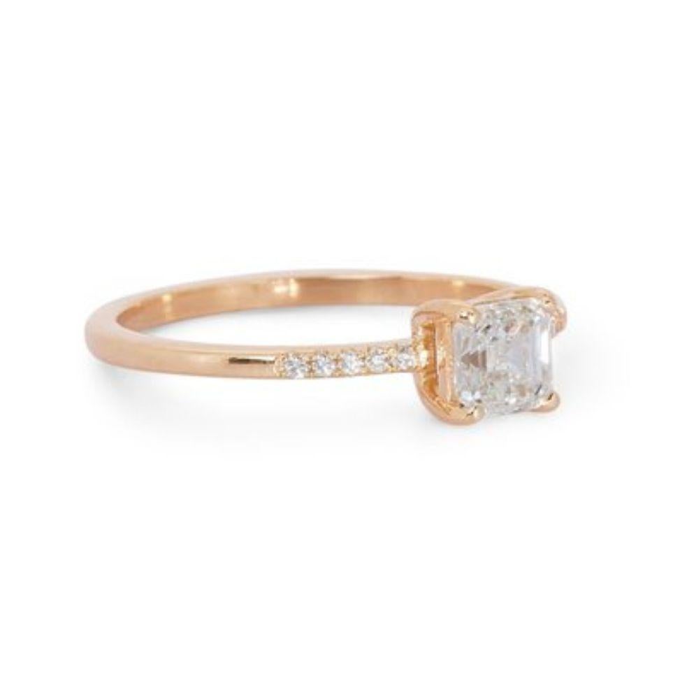 Embrace captivating geometry and sophisticated charm with this breathtaking asscher diamond ring, showcasing a dazzling 1.02 carat center stone that exudes brilliance and modern elegance. Crafted with precision and attention to detail, the band