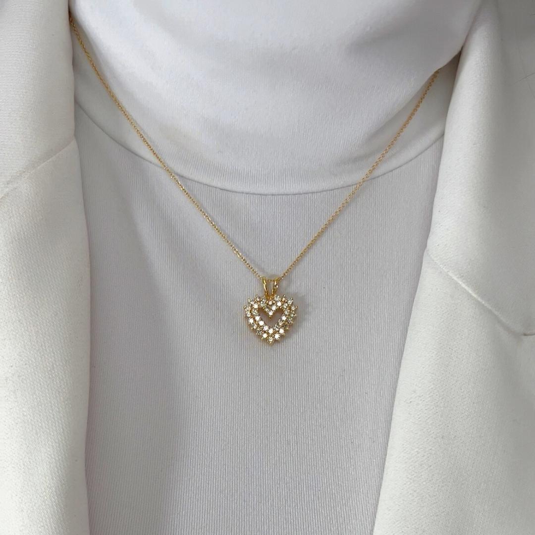 Elegant 1.08ct Diamonds Necklace with Heart-Shaped Pendant in 18k Yellow Gold - IGI Certified

Indulge in timeless luxury with this exquisite 18K yellow gold necklace, adorned with 36 dazzling round diamonds totaling 1.08ct. Weighing a delicate