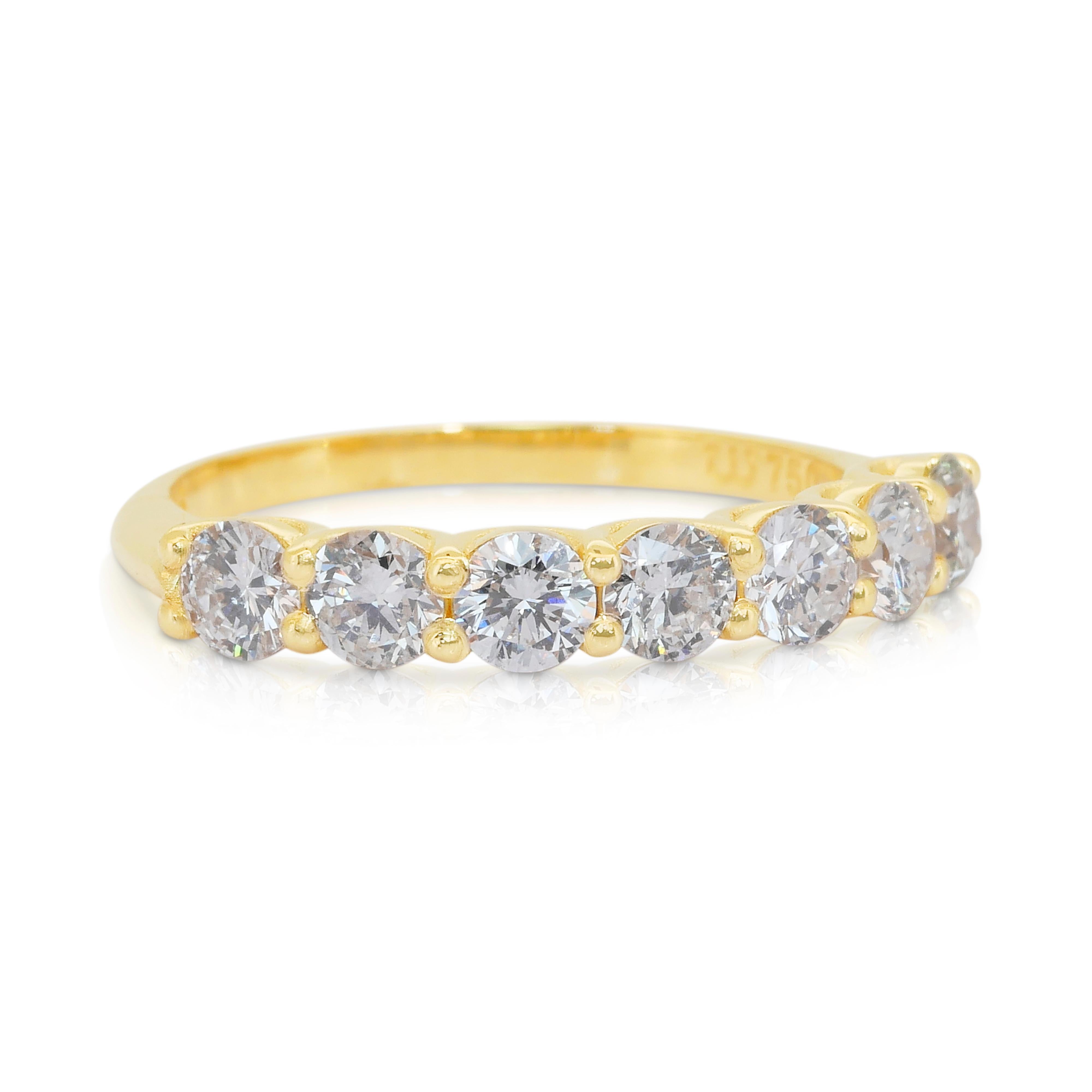 Eleganter 1,35-Karat-Diamanten-Halb-Ewigkeitsring aus 18k Gelbgold - IGI-zertifiziert

Erhöhen Sie Ihre Eleganz mit diesem atemberaubenden Diamantring aus 18 Karat Gelbgold, der sieben exquisite runde Brillanten von insgesamt 1,35 Karat präsentiert.