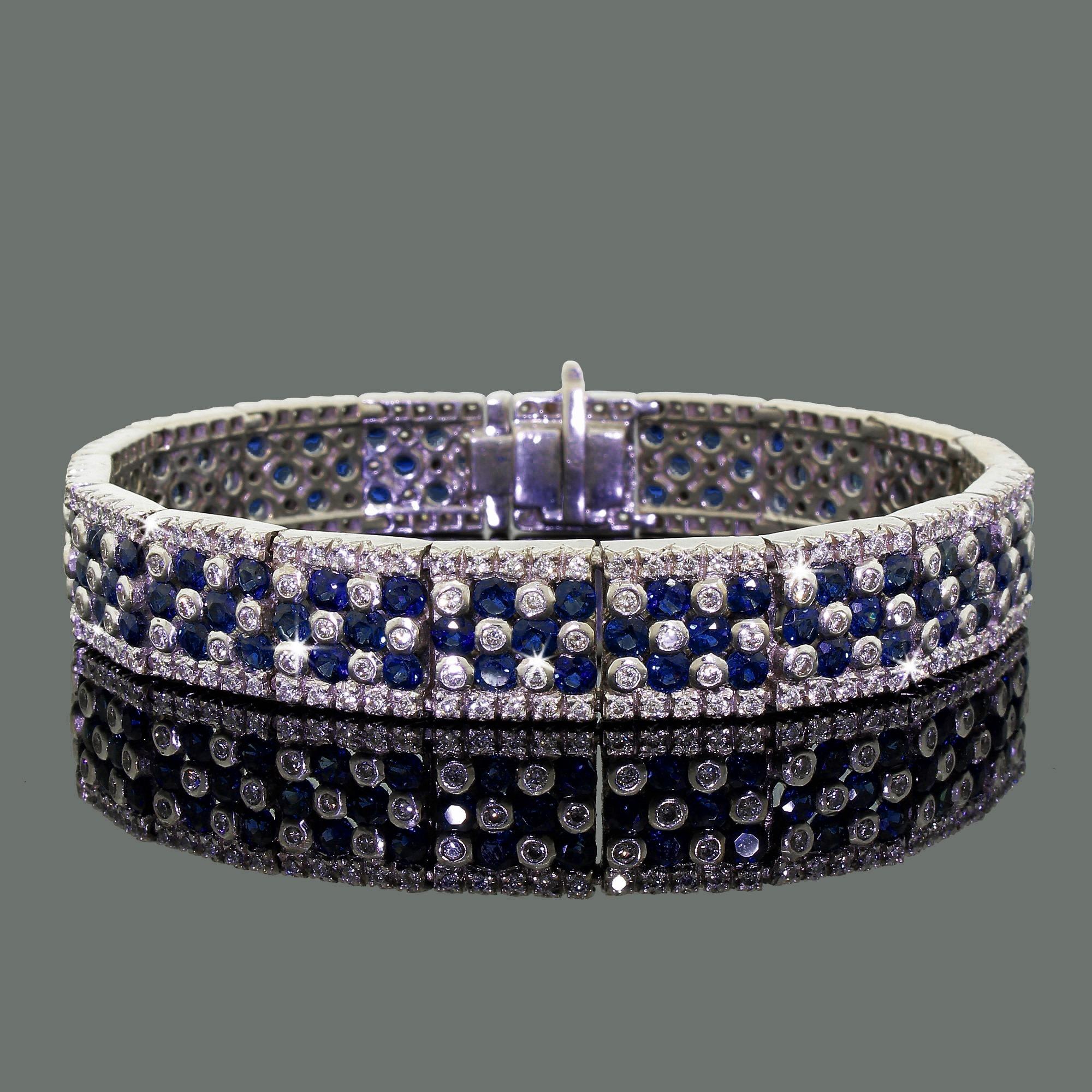 This is a very classy and elegant bracelet in person, lavish 14K white gold encompasses a sea of Diamonds and Sapphires stones.
A beautiful piece of jewelry that is crafted out of gorgeous thick 14K white gold and features 108 genuine Blue