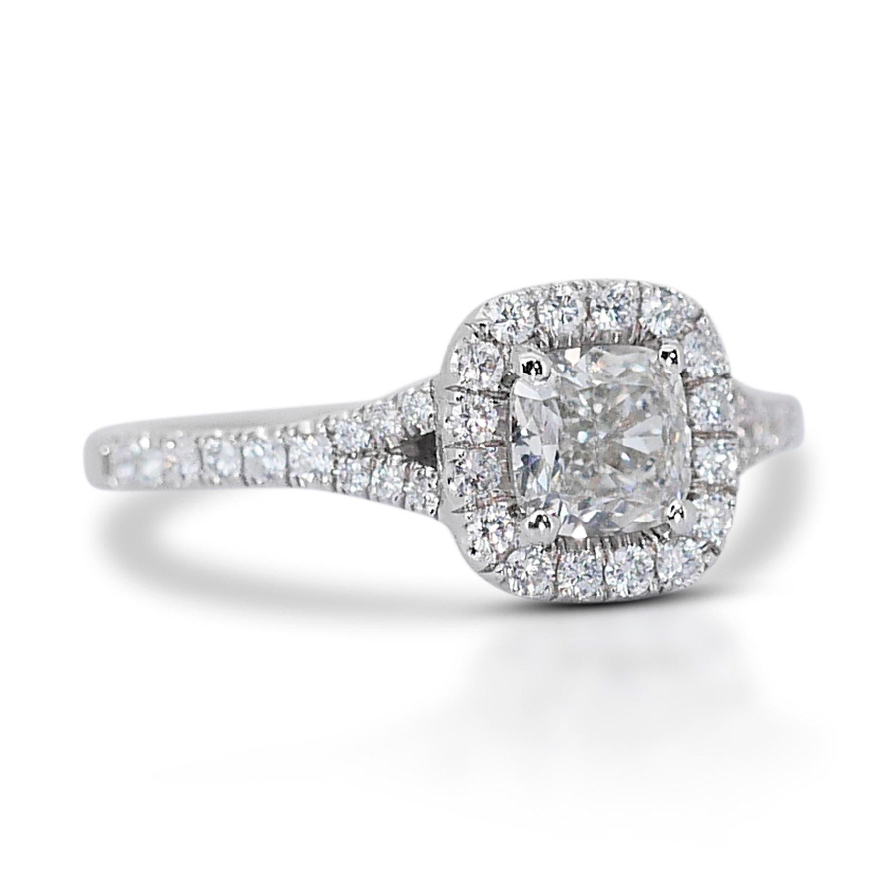 Elegant 1.40ct Cushion-Cut Diamond Halo Ring in 18k White Gold - GIA Certified

Step into the spotlight with this elegant 18k white gold diamond ring, featuring a breathtaking 1.02-carat cushion-cut main diamond. Surrounding 40 round side diamonds