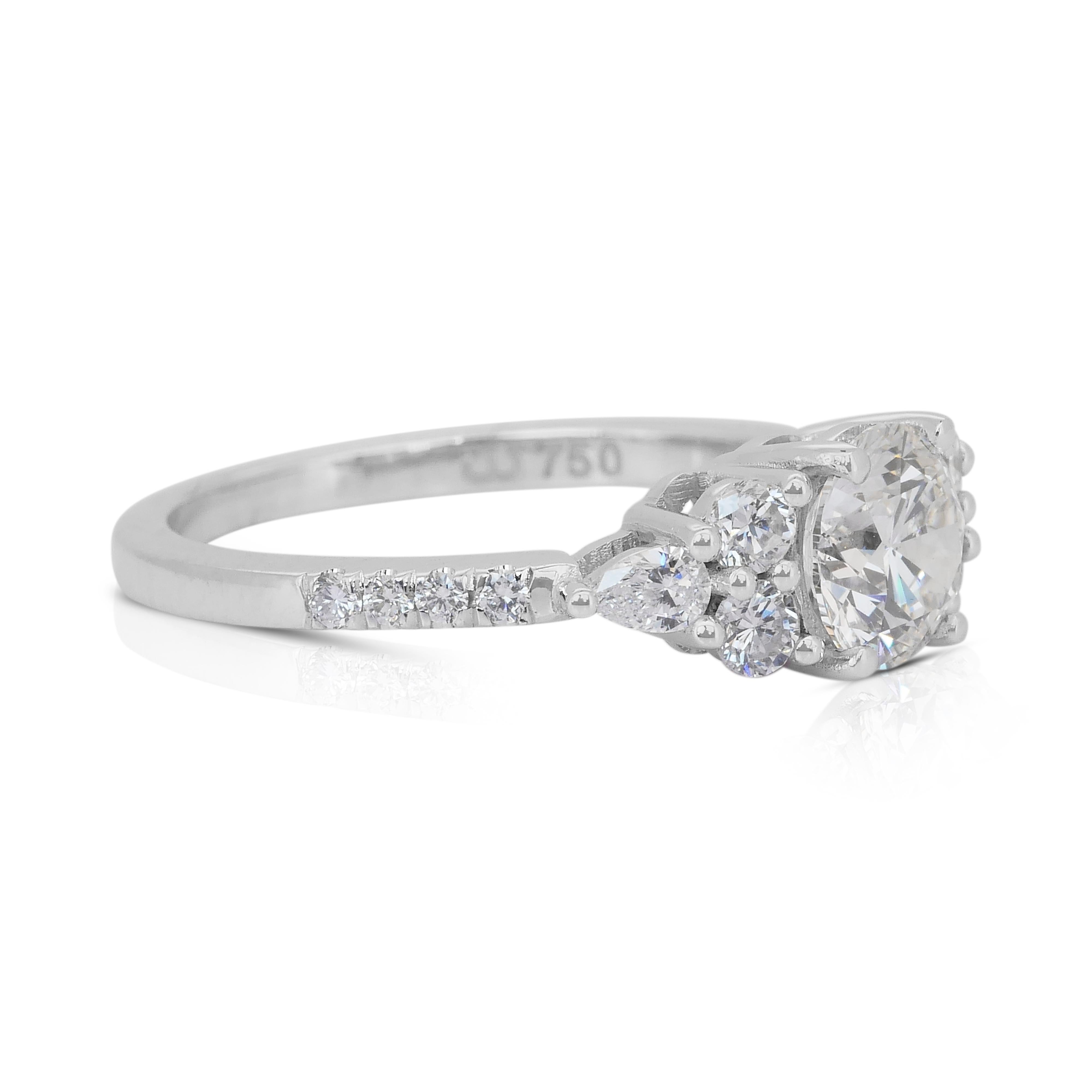 Elegant 1.48ct Diamonds Ring in 18k White Gold - IGI Certified

This exquisite 18k white gold ring centers on a dazzling 1.00ct round brilliant diamond. Masterfully cut to an excellent grade, the center stone radiates intense brilliance. Flanked by