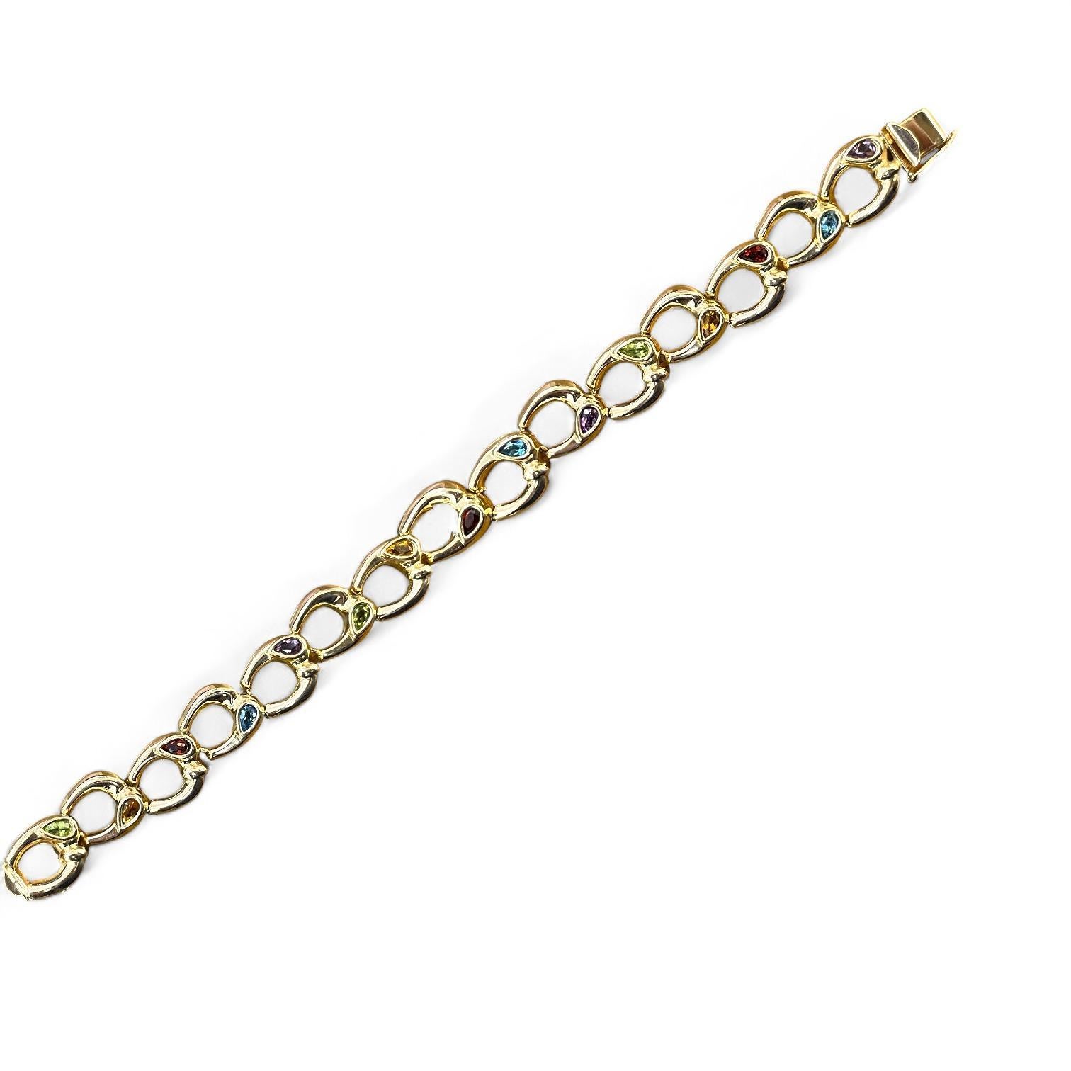 Moderne Bracelet élégant en or 14 carats avec maillons ovales imbriqués et pierres précieuses colorées en vente