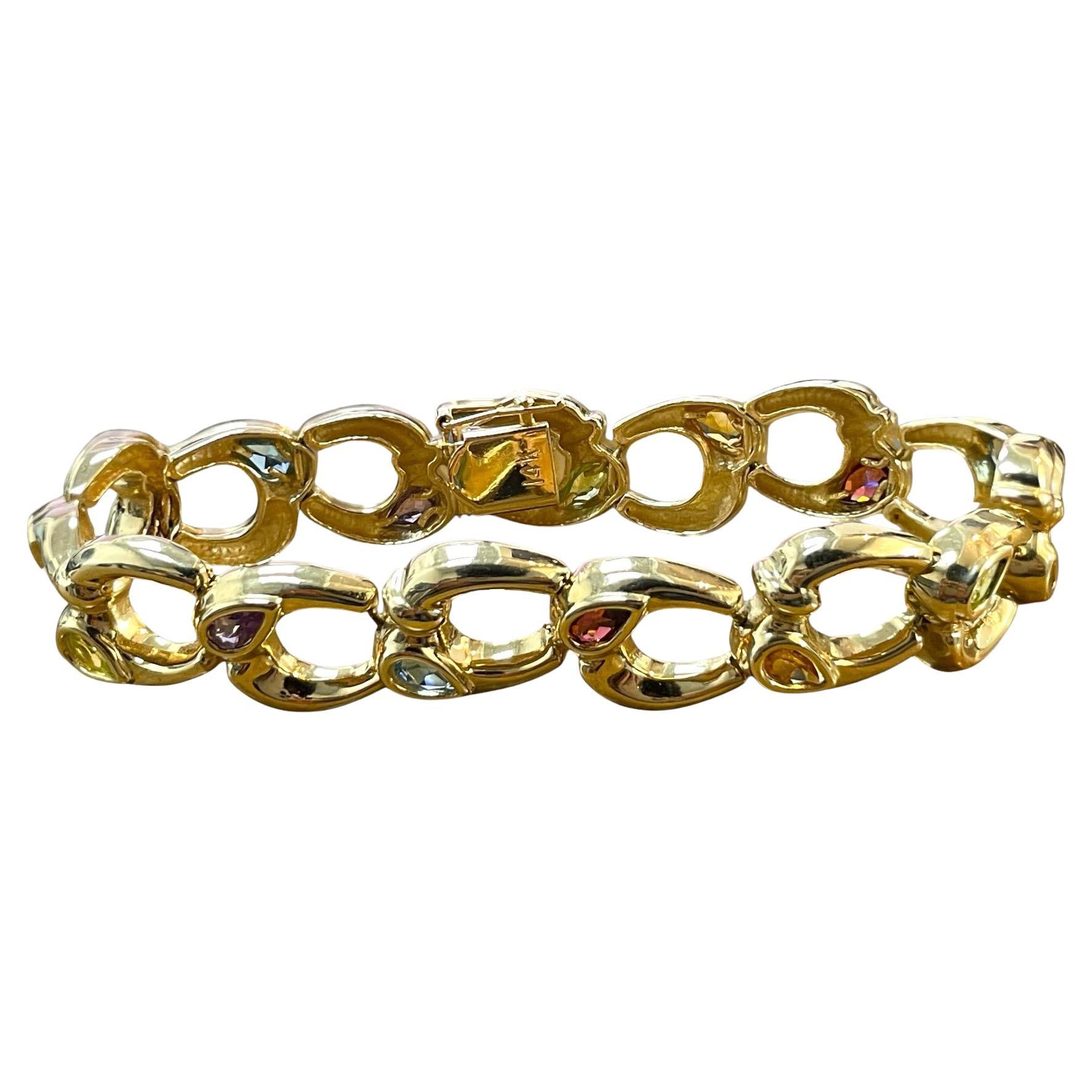 Elegant 14K Gold Bracelet with Interlocking Oval Links and Colorful Gemstones