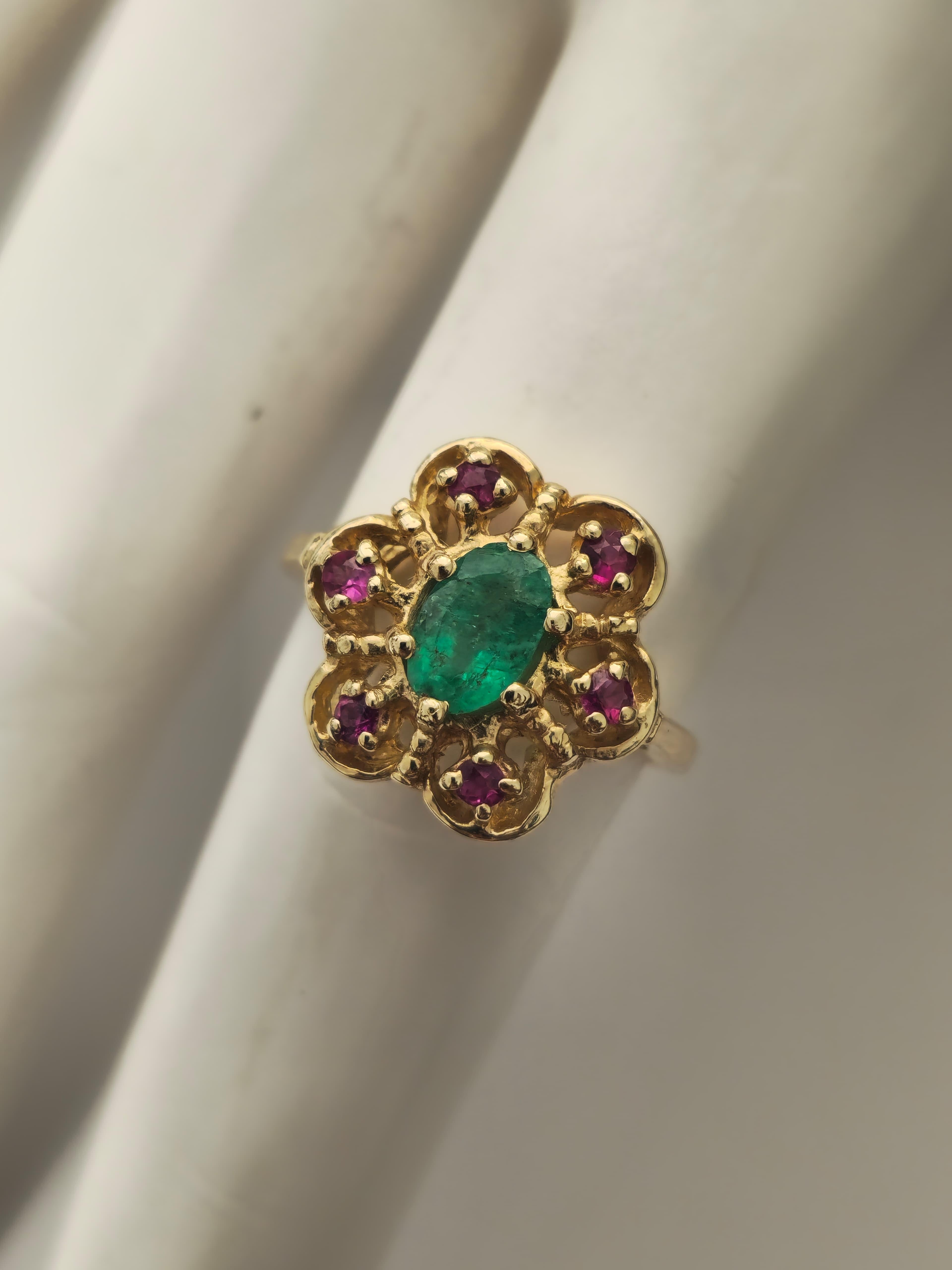 Explore the allure of this 14kt gold ring showcasing a captivating 0.60ct emerald and a vibrant 0.40ct ruby, combining for a total of 1ct. The ring weighs 3.6 grams and is sized for US 5.25, with resizing options available for the perfect fit. This