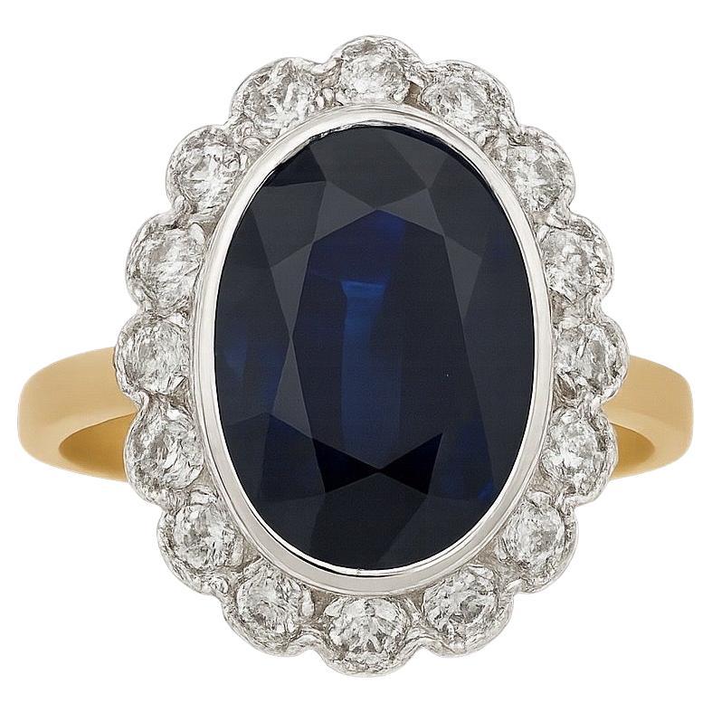 Eleganza dell'anello aureola con zaffiro e diamante in oro 14K in vendita