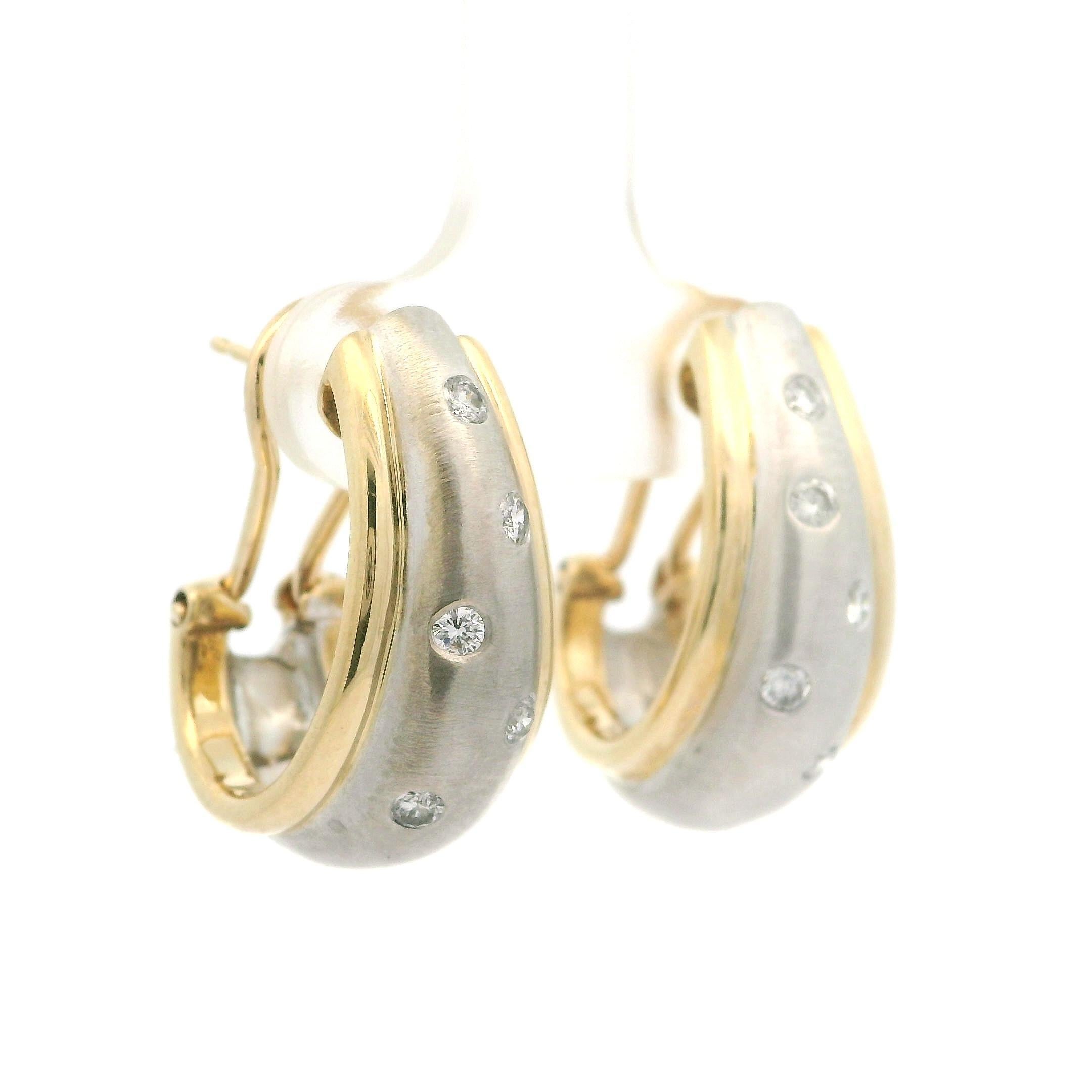 –Stone(s)–
(10) Natural Genuine Diamonds - Round Brilliant Cut - Burnish Flush Set - Nice White Color - 0.28ctw (approx.)

Material: Solid 14k White & Yellow Gold
Weight: 12.09 Grams
Backing: Post Backs w/ Omega Closures (Pierced ears are