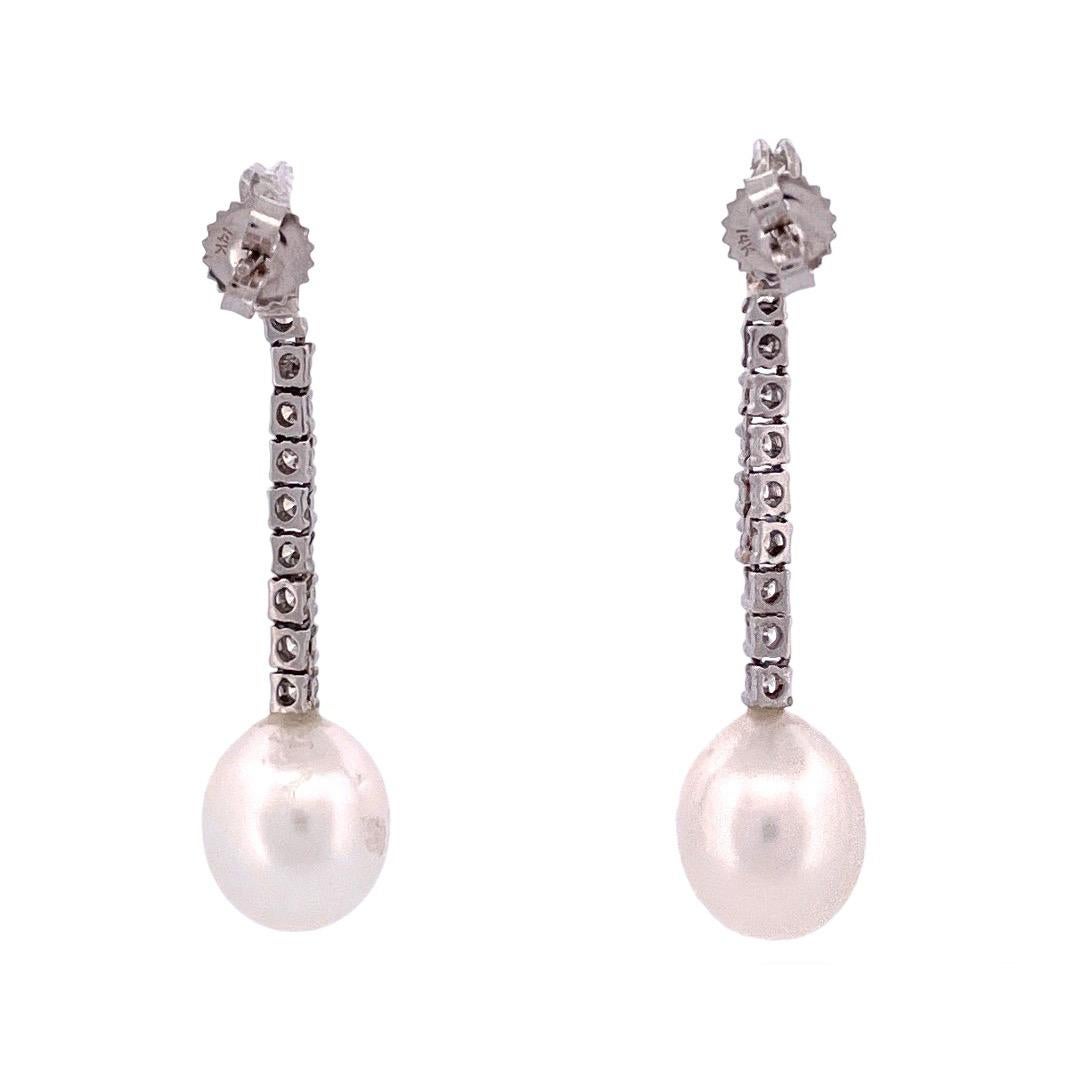 Modern Elegant 14k White Gold Diamond and Pearl Dangle Earrings For Sale