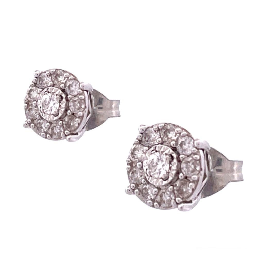Elegant 14K White Gold Diamond Cluster Earrings

Embrace the brilliance of our 14K white gold diamond cluster earrings, featuring a total carat weight of 0.20 carats. The carefully crafted design showcases a cluster of sparkling diamonds, exuding