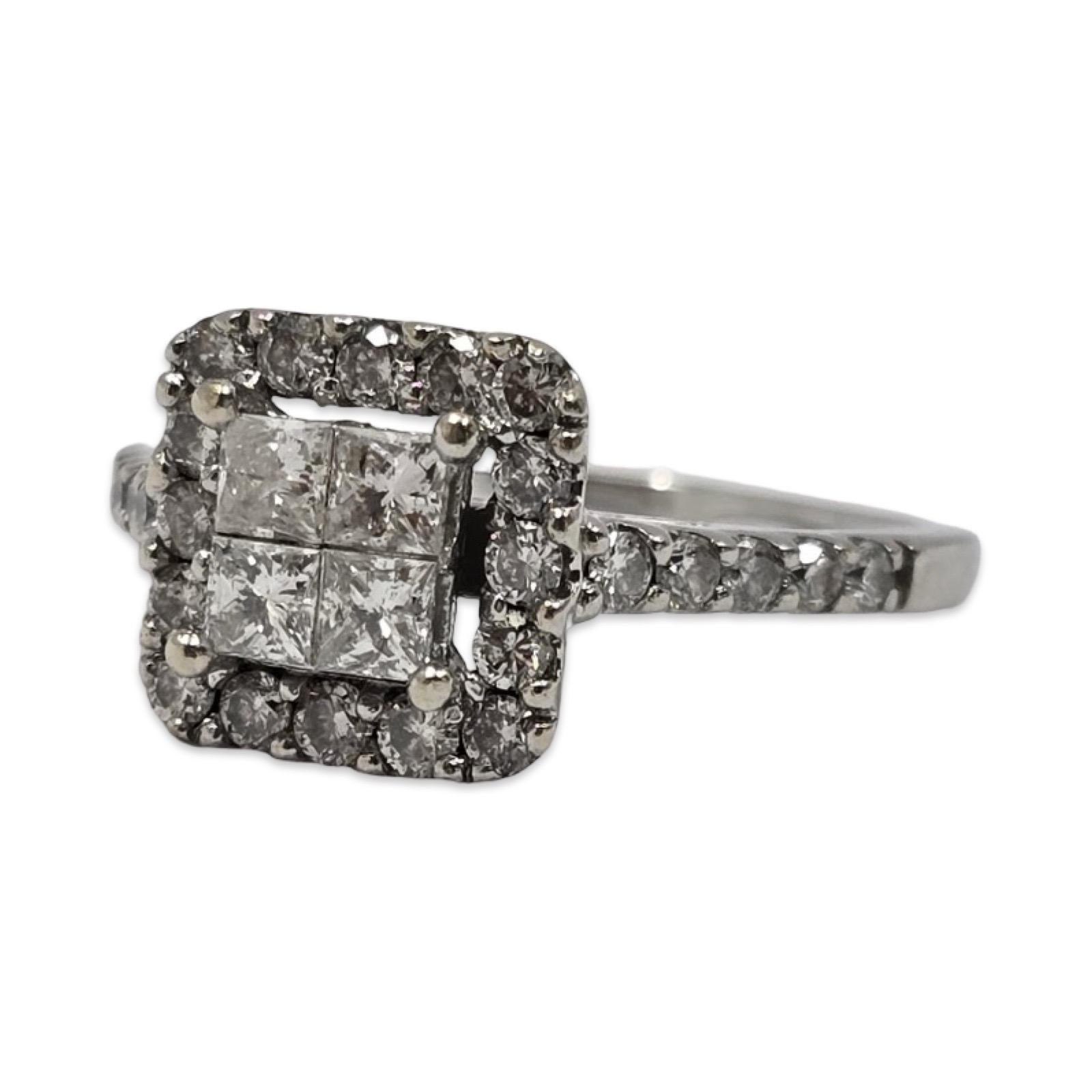 Radiating brilliance from every angle, this 1.01 tcw diamond halo ring is a masterclass in timeless elegance. Crafted in luminous 14K white gold, it features a captivating center cluster of four princess-cut diamonds, each precisely set to form a