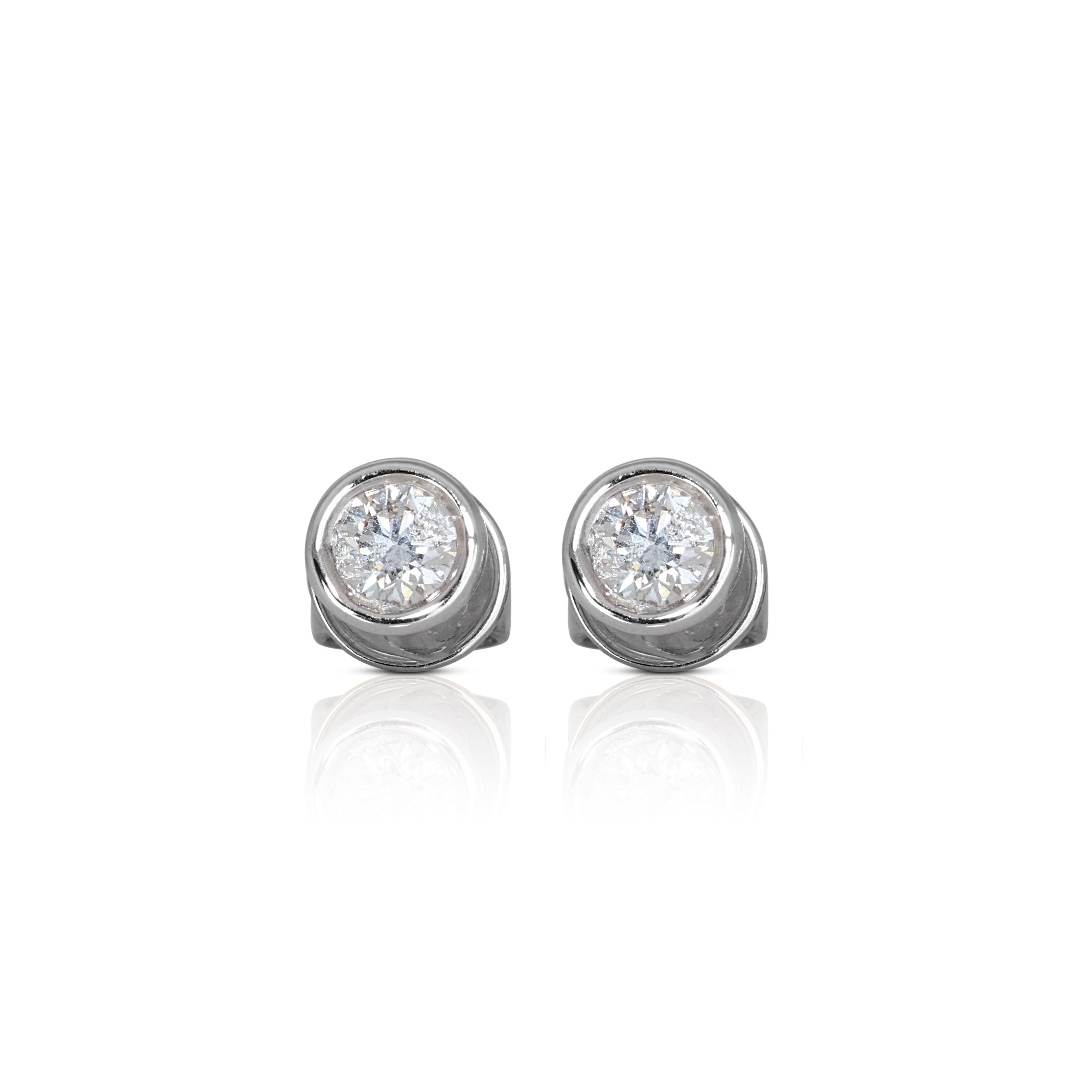 Elevate your jewelry collection to new heights with our exquisite 14K White Gold Diamond Earrings. Crafted with precision and designed to radiate timeless sophistication, these earrings are the epitome of elegance.
Product Details:

Metal: 14K White