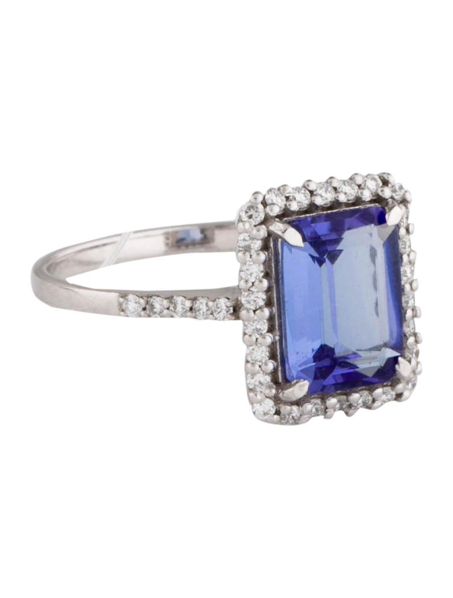 Discover the timeless elegance of our 14K White Gold Tanzanite and Diamond Cocktail Ring, a masterpiece that combines luxury with sophistication. This exquisite ring features a prominent 2.10 carat Rectangular Step Cut Tanzanite, set in