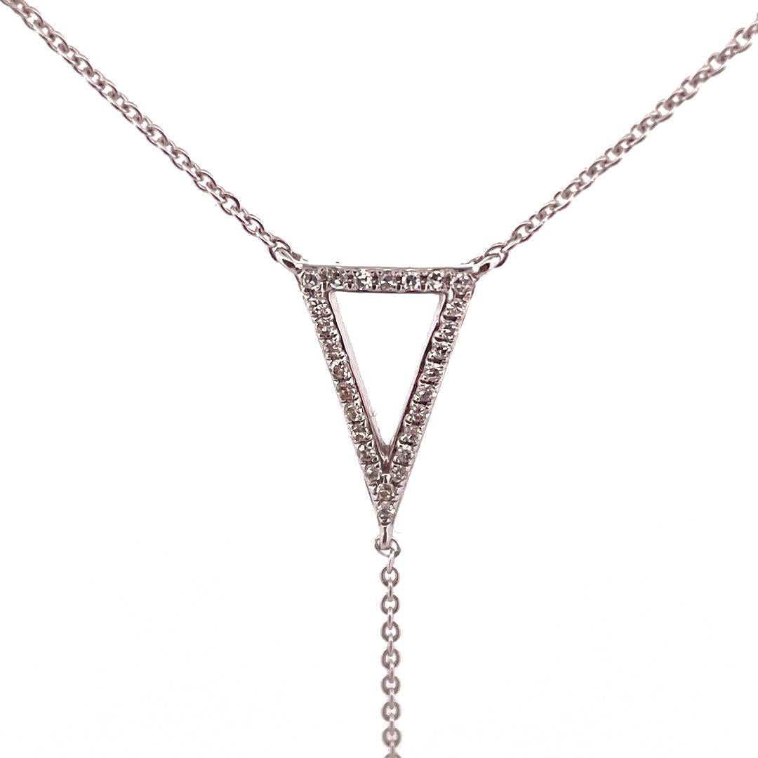 Elegant 14k White Gold Triangle Diamond Necklace

Enhance your jewelry collection with this stunning 14k White Gold Triangle Diamond Necklace. Featuring a delicate triangle station adorned with 0.20tcw sparkling diamonds. The dangling triangle adds