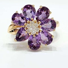 Elegant 14K Yellow Gold Amethyst Flower Ring with Diamonds