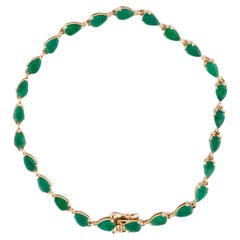 Elegant 14K Yellow Gold Bracelet with Pear Brilliant Emeralds