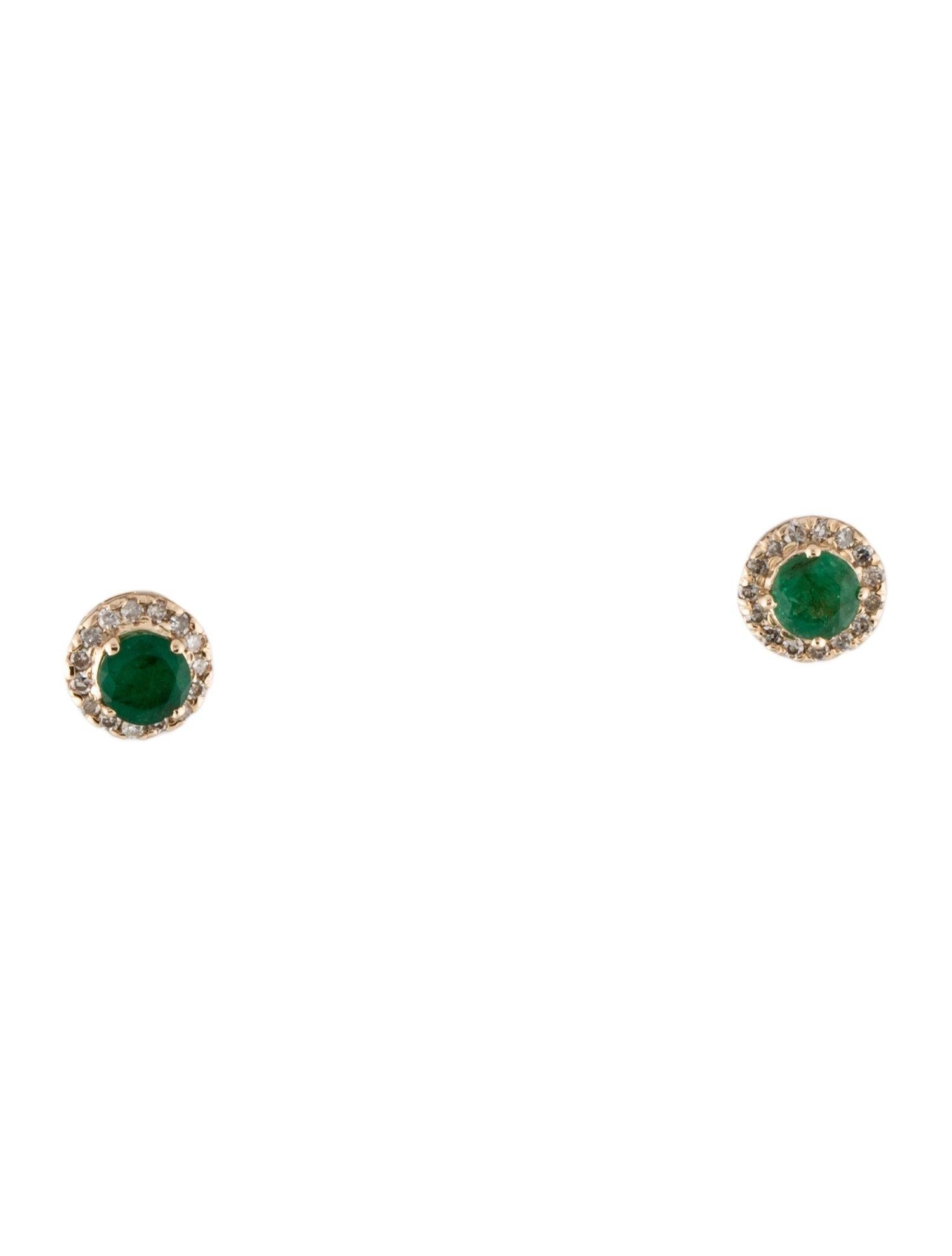 Discover the allure of these meticulously crafted 14K Yellow Gold Stud Earrings, each adorned with a 0.37 Carat Round Modified Brilliant Emerald, complemented by an ensemble of 0.12 Carat Near Colorless Diamonds. These earrings, embodying