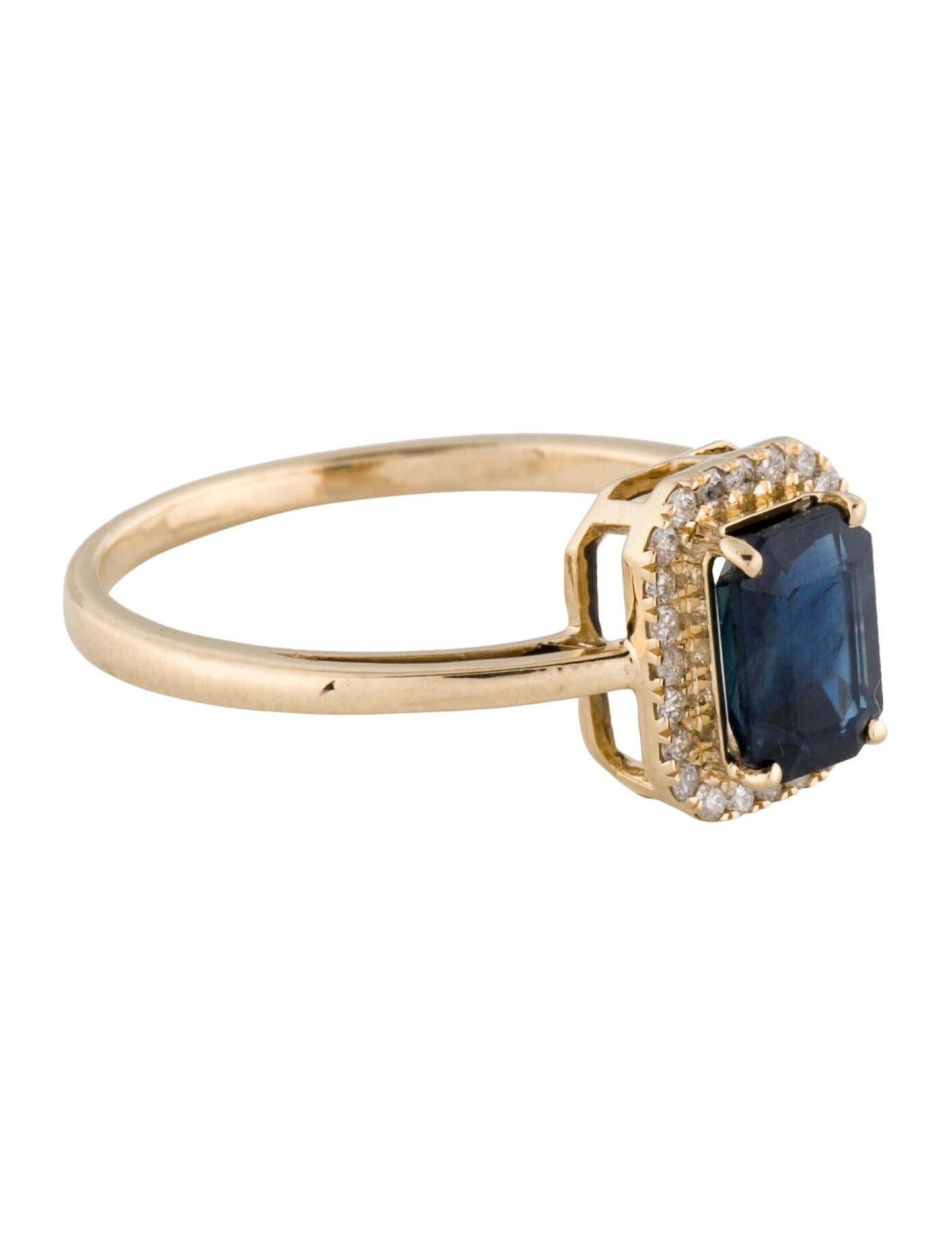 Discover timeless elegance with our stunning 14K Yellow Gold Cocktail Ring, a true masterpiece of fine jewelry design. Sized at 6.75, this exquisite piece features a centerpiece of a 0.98 carat Emerald Cut Sapphire, radiating a deep blue hue that