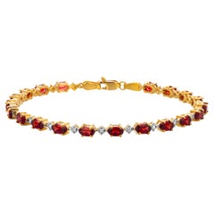 Stapelbares Vintage-Armband aus 14 Karat Gelbgold mit Granat und Diamant