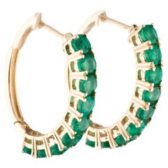 Elegant 14K Yellow Gold Hoop Earrings with Brilliant Round Emeralds