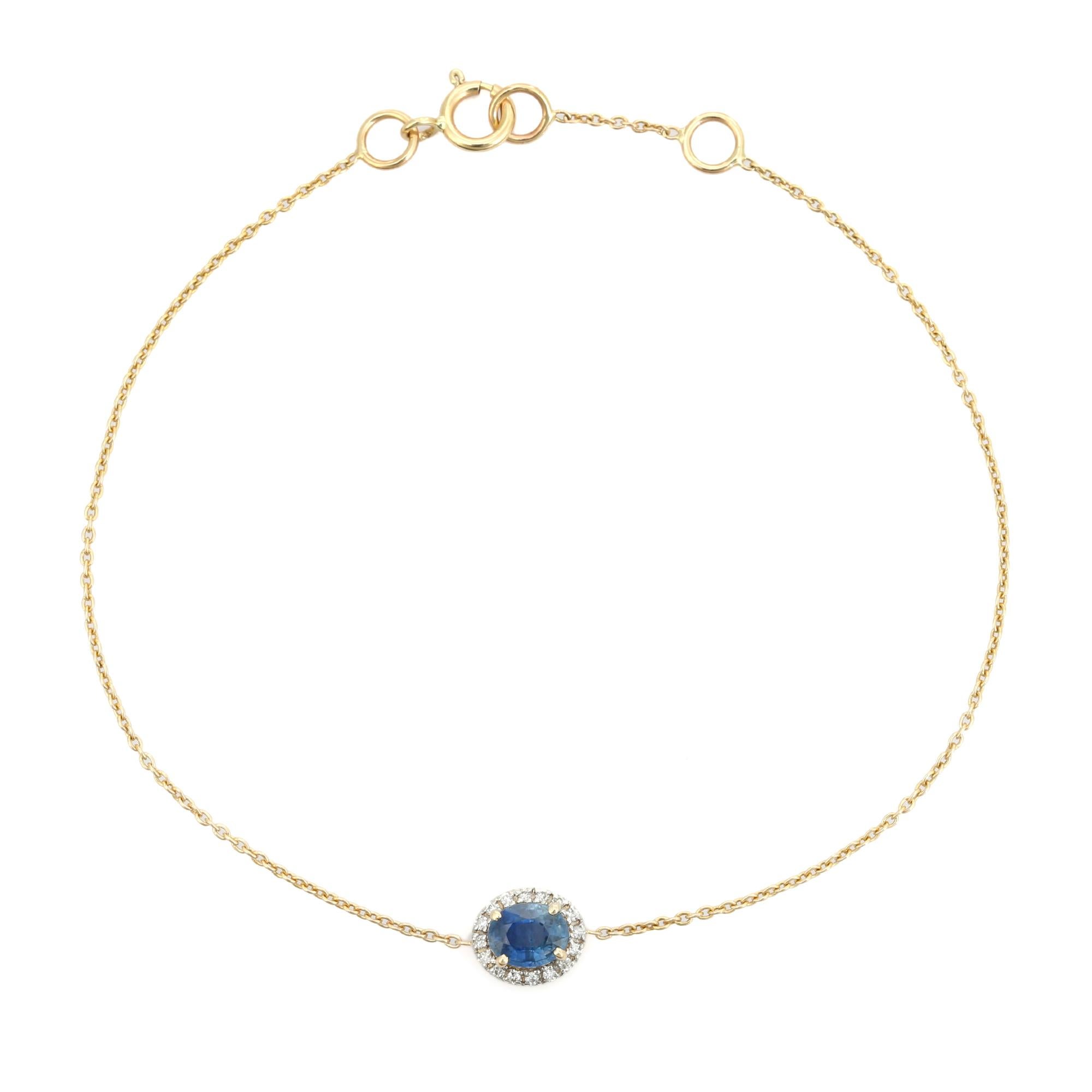 Moderne Elegant Bracelet en or jaune 14K avec saphir bleu de taille ovale et halo de diamants en vente