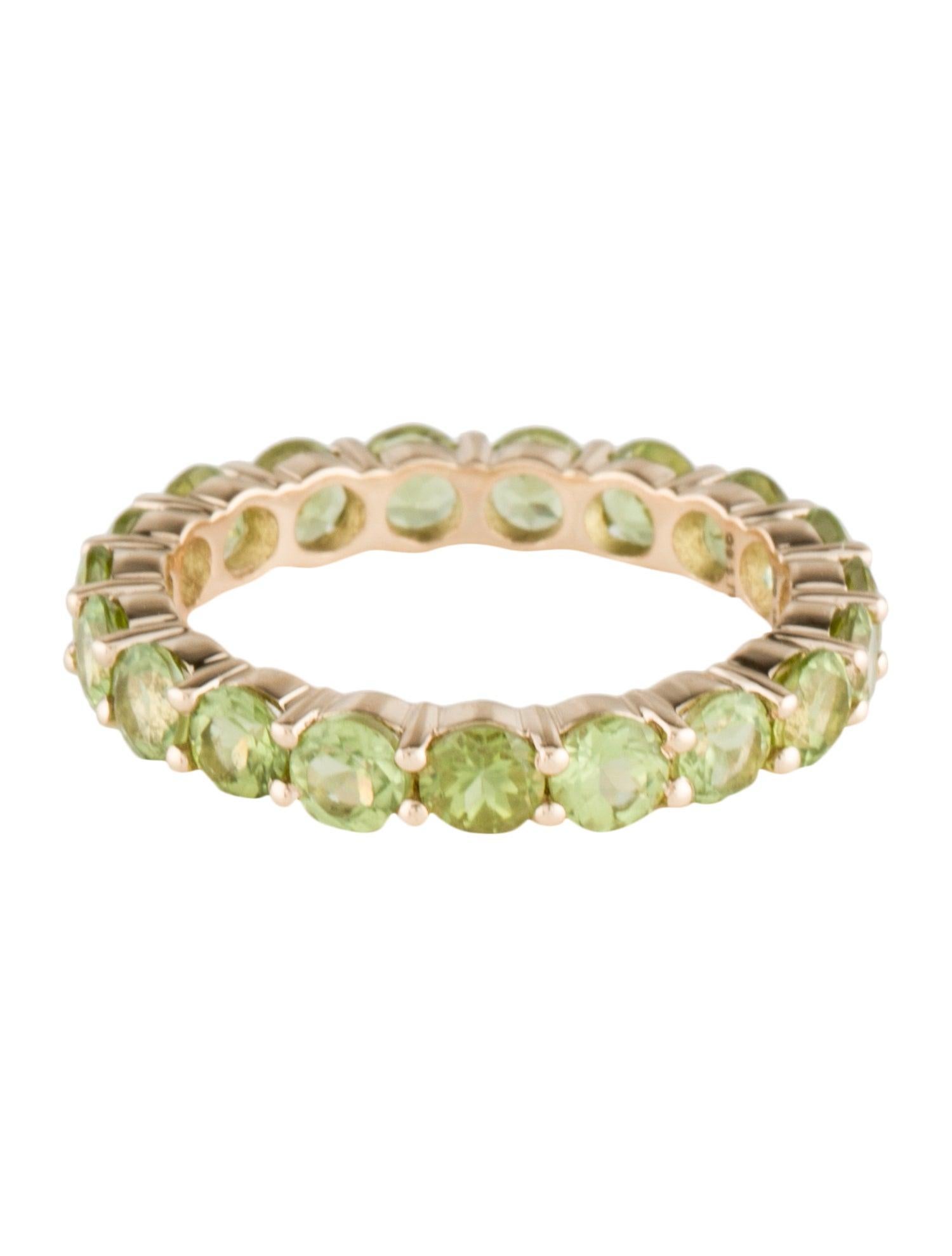 Round Cut  Elegant 14K Yellow Gold Peridot Eternity Band with Faceted Round Peridots For Sale