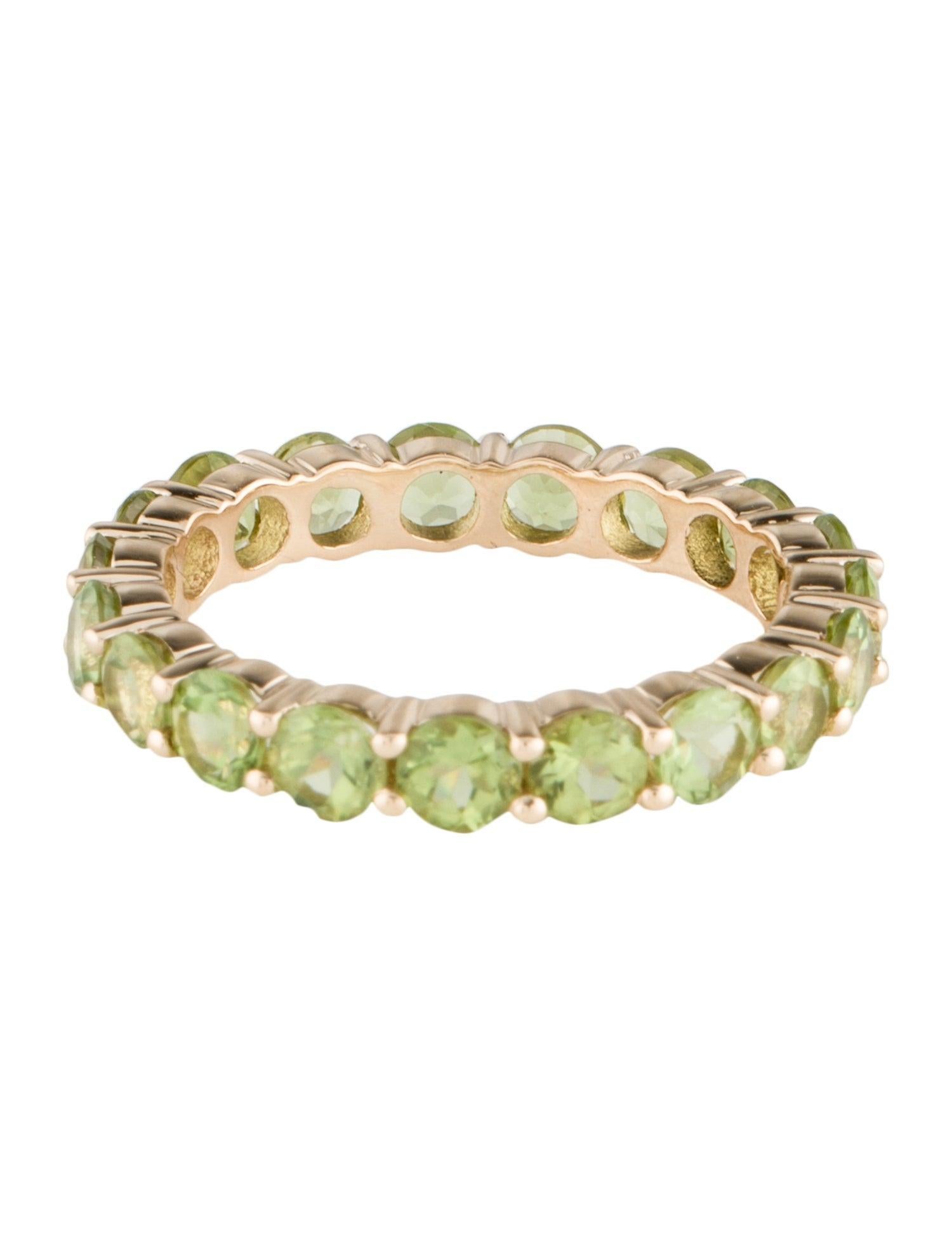  Elegant 14K Yellow Gold Peridot Eternity Band with Faceted Round Peridots In New Condition For Sale In Holtsville, NY