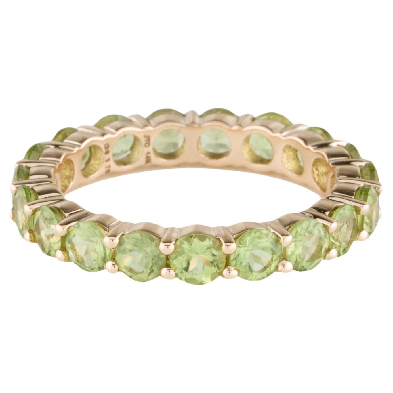  Elegant 14K Yellow Gold Peridot Eternity Band with Faceted Round Peridots For Sale