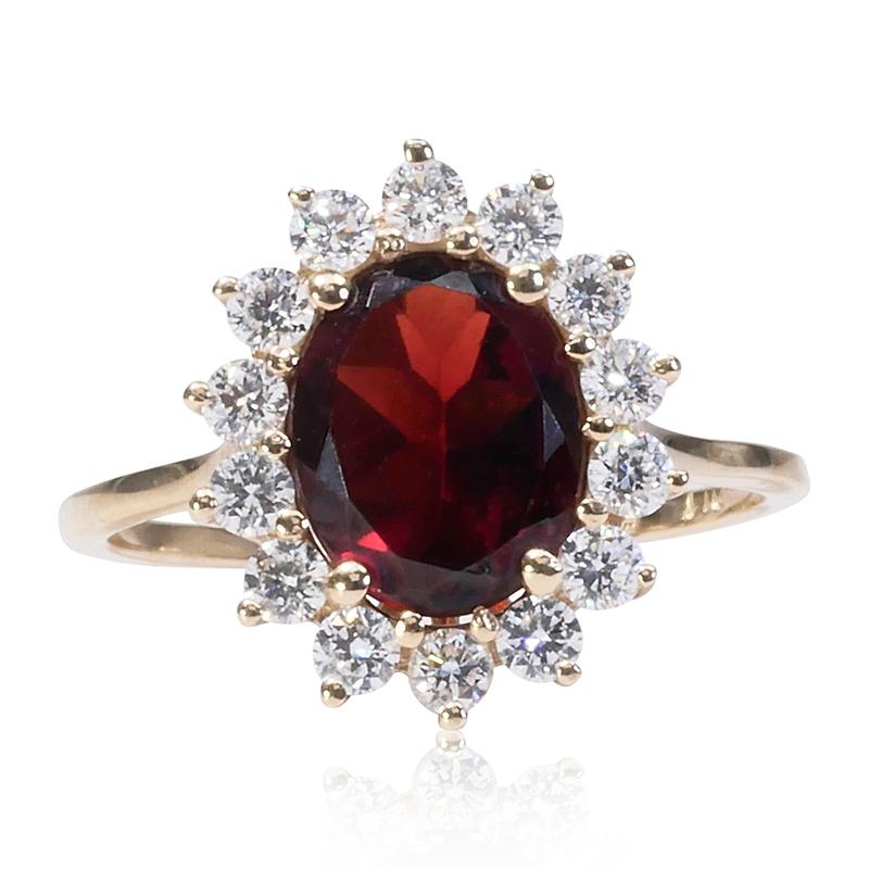 Stunning ring made from 14k white gold with 2.59 total carat of oval garnet and round brilliant diamonds. This ring comes with an AIG report and a fancy box.

-1 almandine main stone of 2.10 ct.
cut: oval
color: red
clarity: transparent
cut grade: