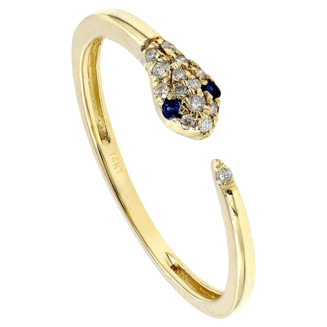 Elegante bague en or jaune 14KT à motif de serpent avec diamants et saphir bleu