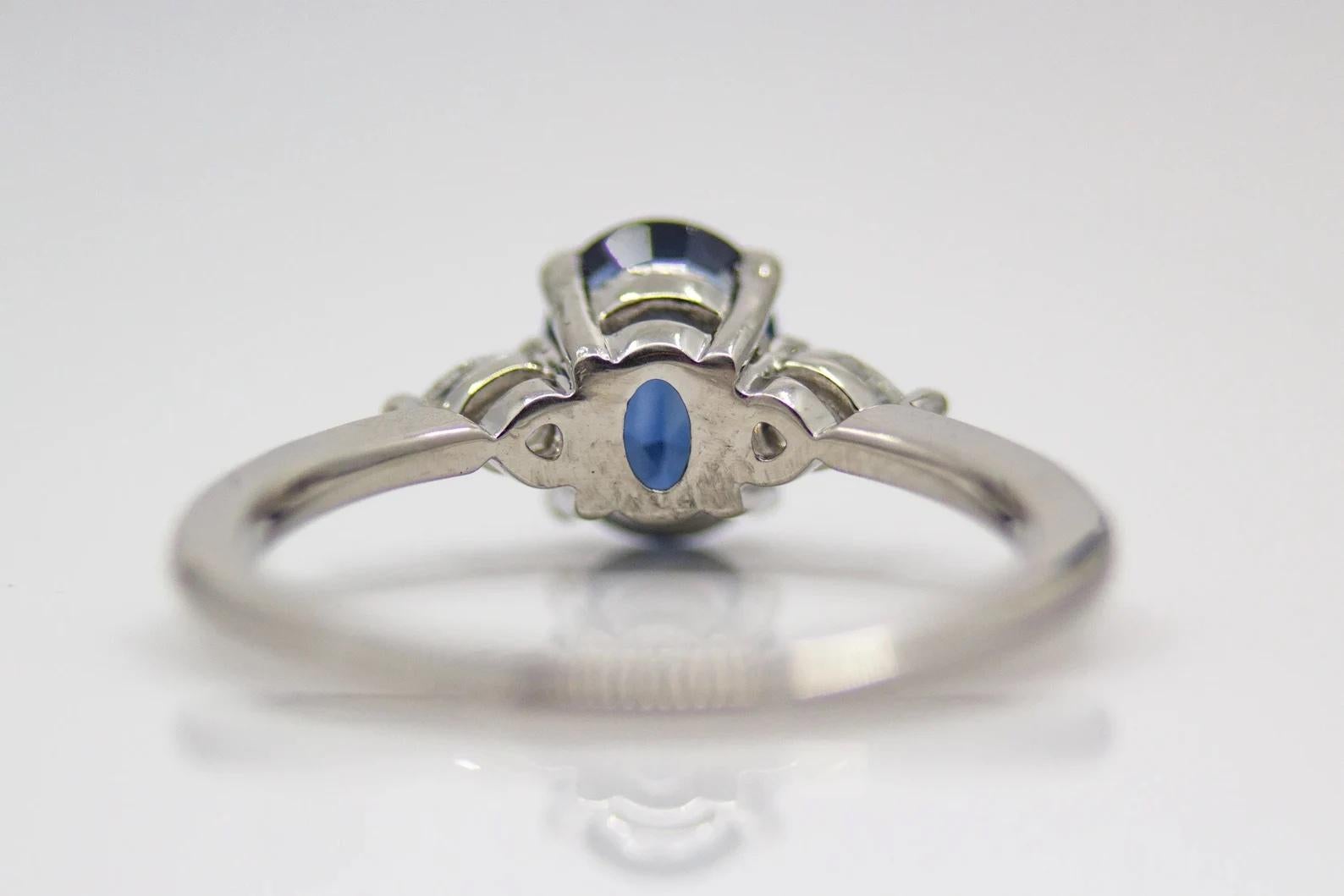 Oval Cut Elegant 1.59ct Ceylon Sapphire & Diamond Three Stone Ring in Platinum For Sale