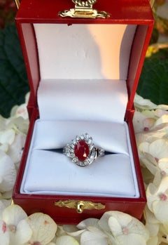 Elegant 1.6 Carat Red Ruby and 1 Carat Diamond Swirl 18 Karat White Gold Ring