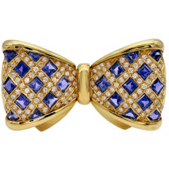 Elegant 18K Gold Bowtie Brooch with Iolite and Diamonds, Italy