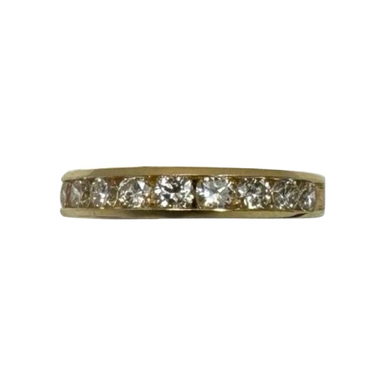 Elegantes Band aus 18K Gold mit Kanalfassung und 0,98ct VS Diamanten im Angebot