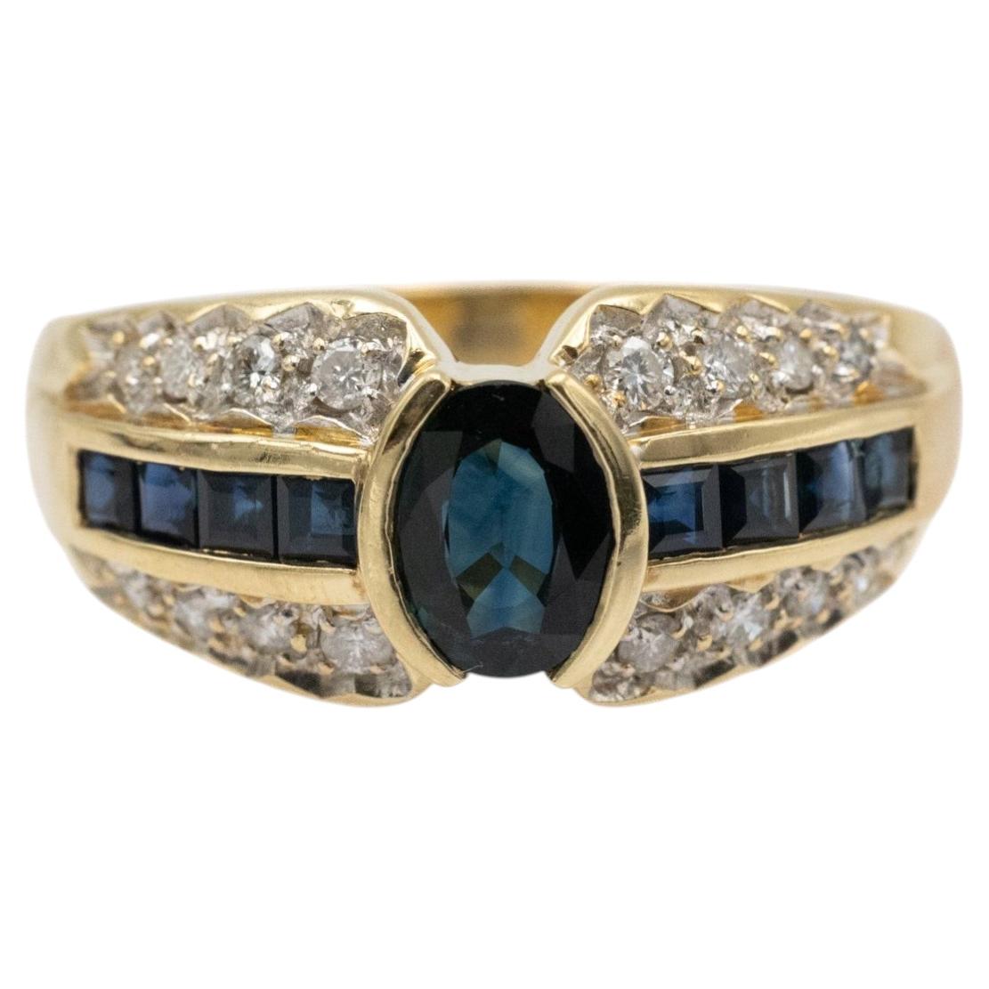 Elegant 18k gold ring with sapphires and diamonds