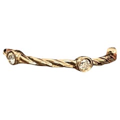 Elegant 18K Gold Rope-Style Ring with Dazzling Diamond Accents