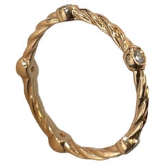 Elegant 18K Gold Rope-Style Ring with Dazzling Diamond Accents