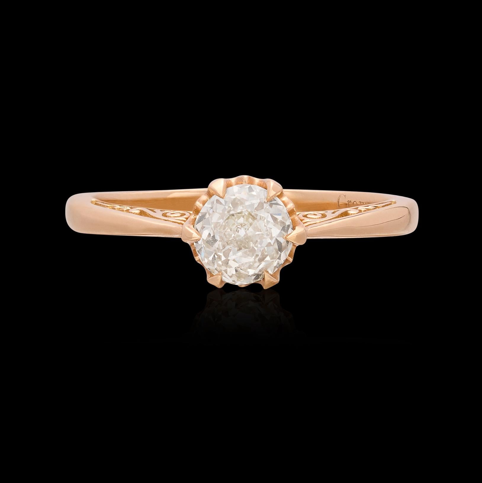 A truly elegant ring featuring a very special diamond. This 18 karat rose gold tulip inspired ring features a unique 0.70 carat GIA graded diamond as the centerpiece. As rare as it is beautiful, the center stone is a Crown Jubilee, a GIA recognized