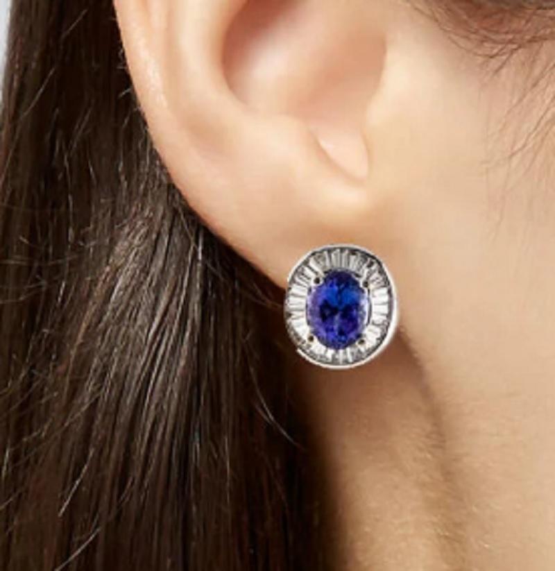 Oval Cut Elegant 18k Tanzanite and Diamond Stud Earrings For Sale