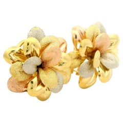 Elegant 18k Tri Color Gold Polished
Textured Finish Flower Omega Earrings Elegant 18k Tri Color Gold Polished
Textured Finish Flower Omega Earrings