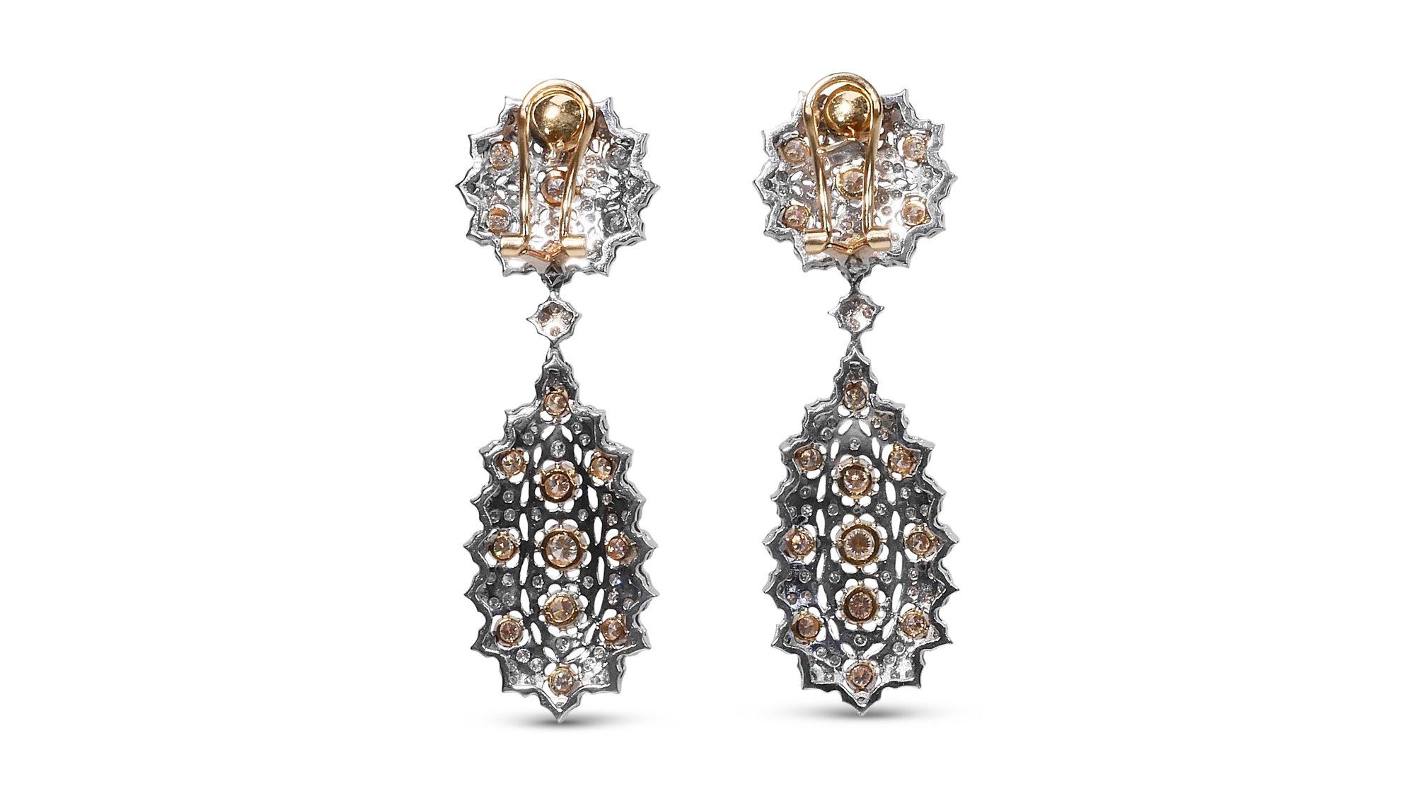 Stunning Art Deco style earrings made from 18k white & yellow gold with 4.50 total carat of round brilliant diamonds. This earring comes with an IGI report and a fancy box.

- 264 diamond main stone of 0.0171 ct. each, total: 4.50 ct. 
Cut: Round