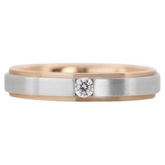 Élégante bague solitaire en or bicolore 18 carats avec diamants