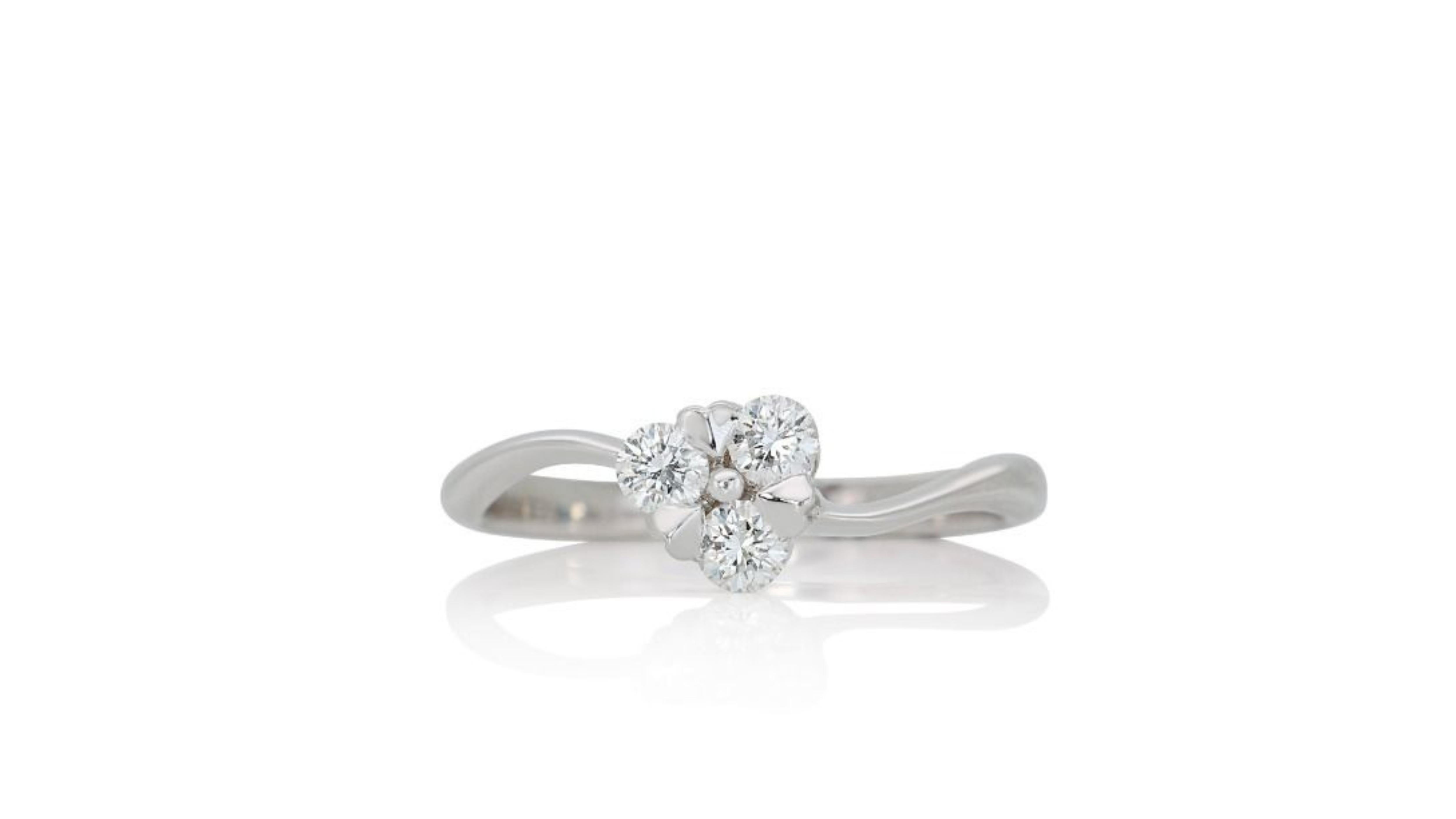 Women's Elegant 18k White Gold .15ct. Round Brilliant Solitaire Diamond Ring For Sale
