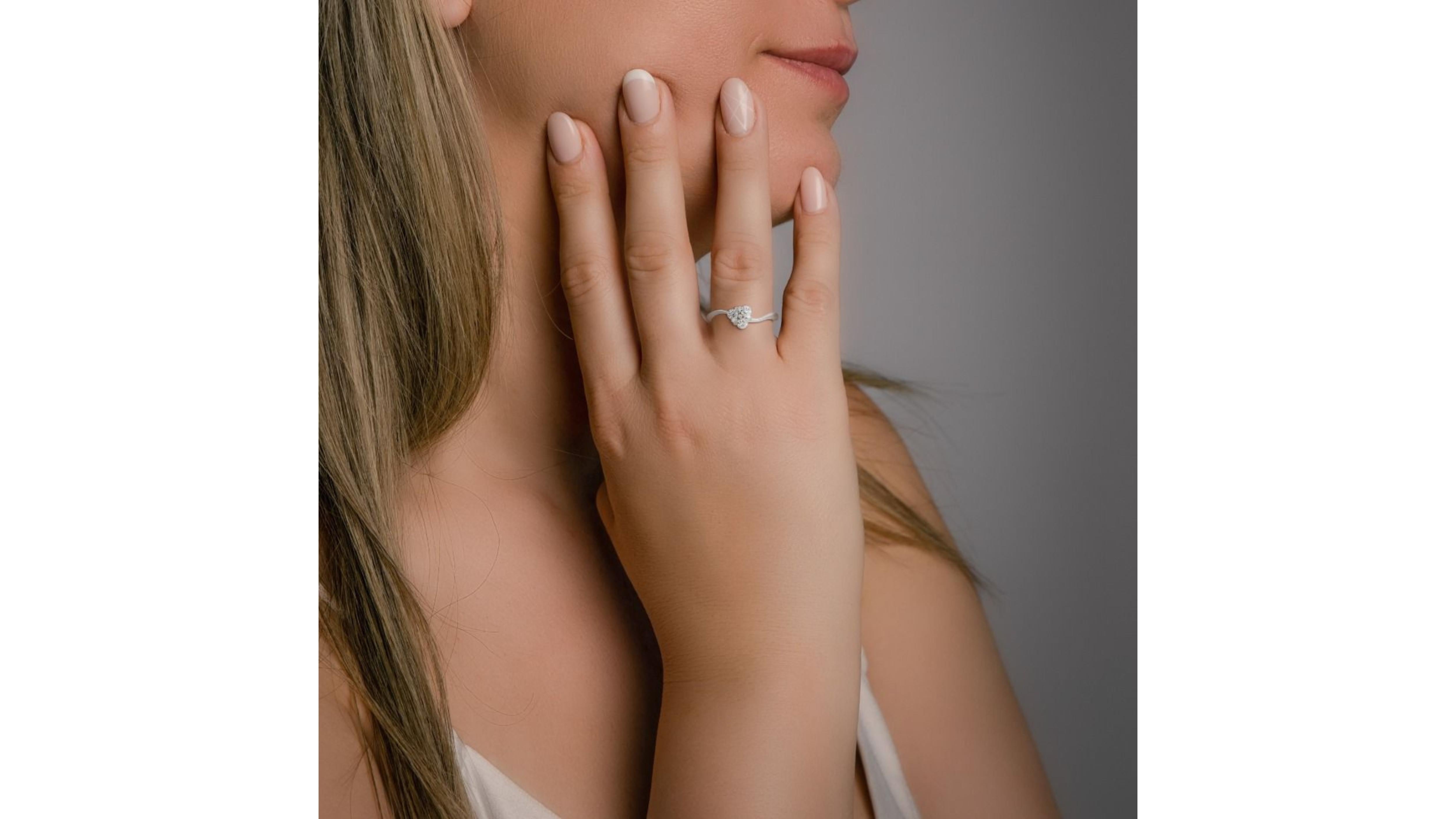 Elegant 18k White Gold .15ct. Round Brilliant Solitaire Diamond Ring For Sale 1